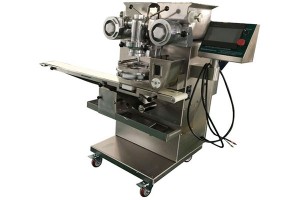 Automatic encrusting machine with rounding