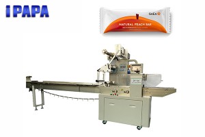 Candy bar wrapping machine