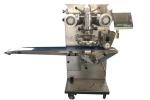 Automatic encrusting machine with rounding