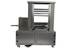 Automatic tray arranging machine