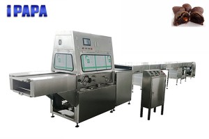 Chocolate coating machine for prunes