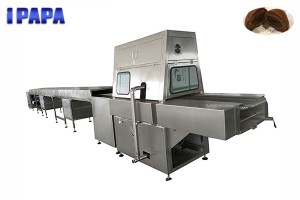 Chocolate coating machine for prunes