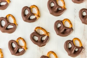 Chocolate coating machine for pretzels