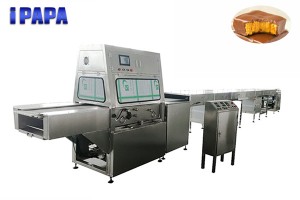 Chocolate coating machine for protein bar